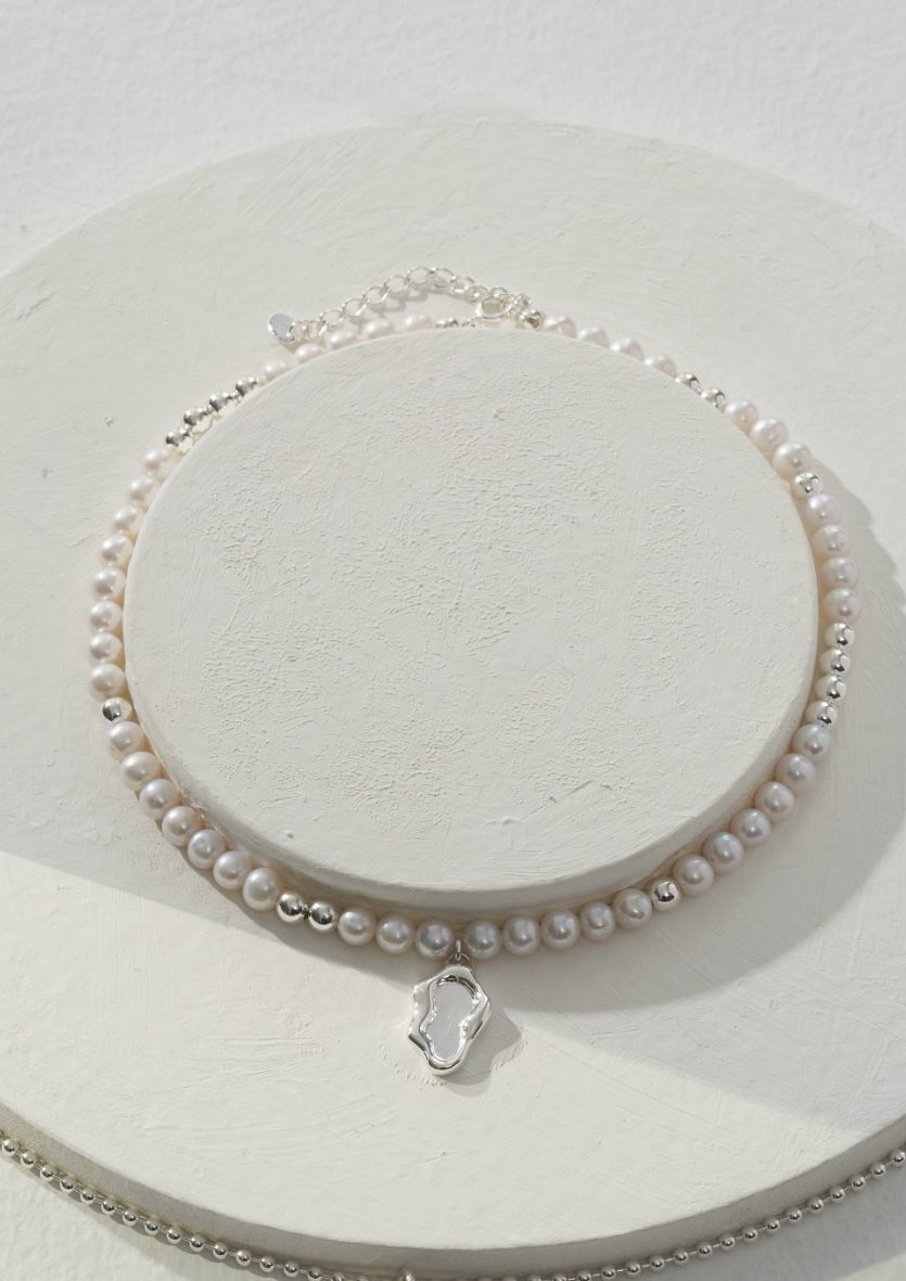 Zen Lakeside Pearl Necklace – Fluid Silver Pendant