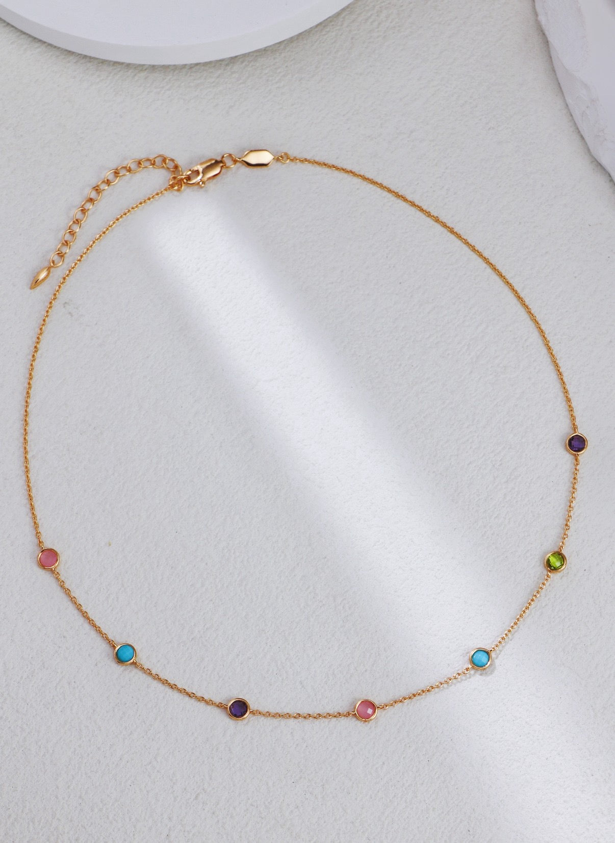 Sterling silver necklace with diamond cut edge color gemstone