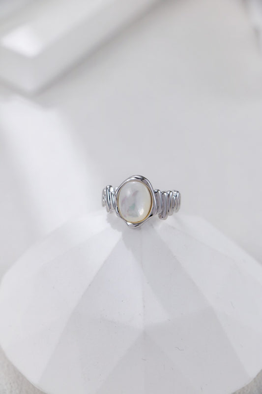 Mother of pearl sterling silver open ring with organic textured design for grounding calm
